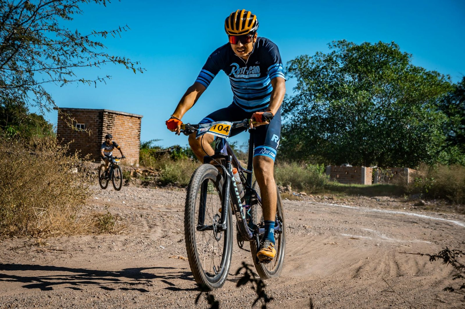 man riding on black bicycle